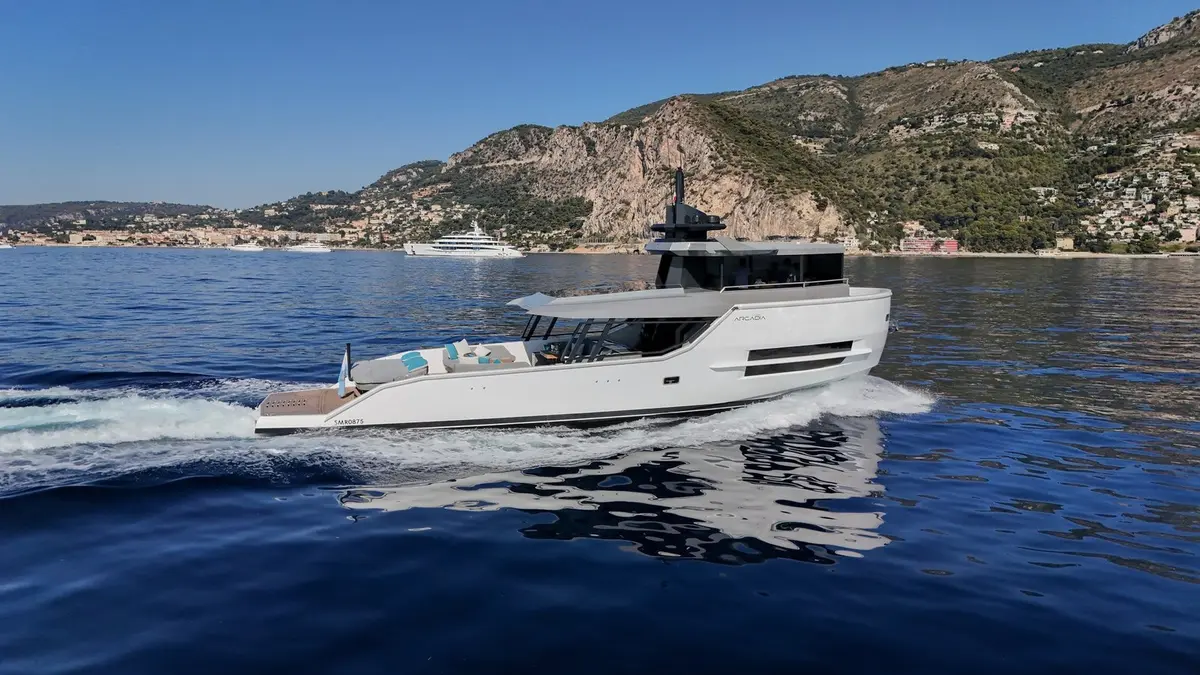 Arcadia Sherpa 60, exterior — Priveo Yachts, Europe. Sunlit decks and solar-quiet cruising along the coast