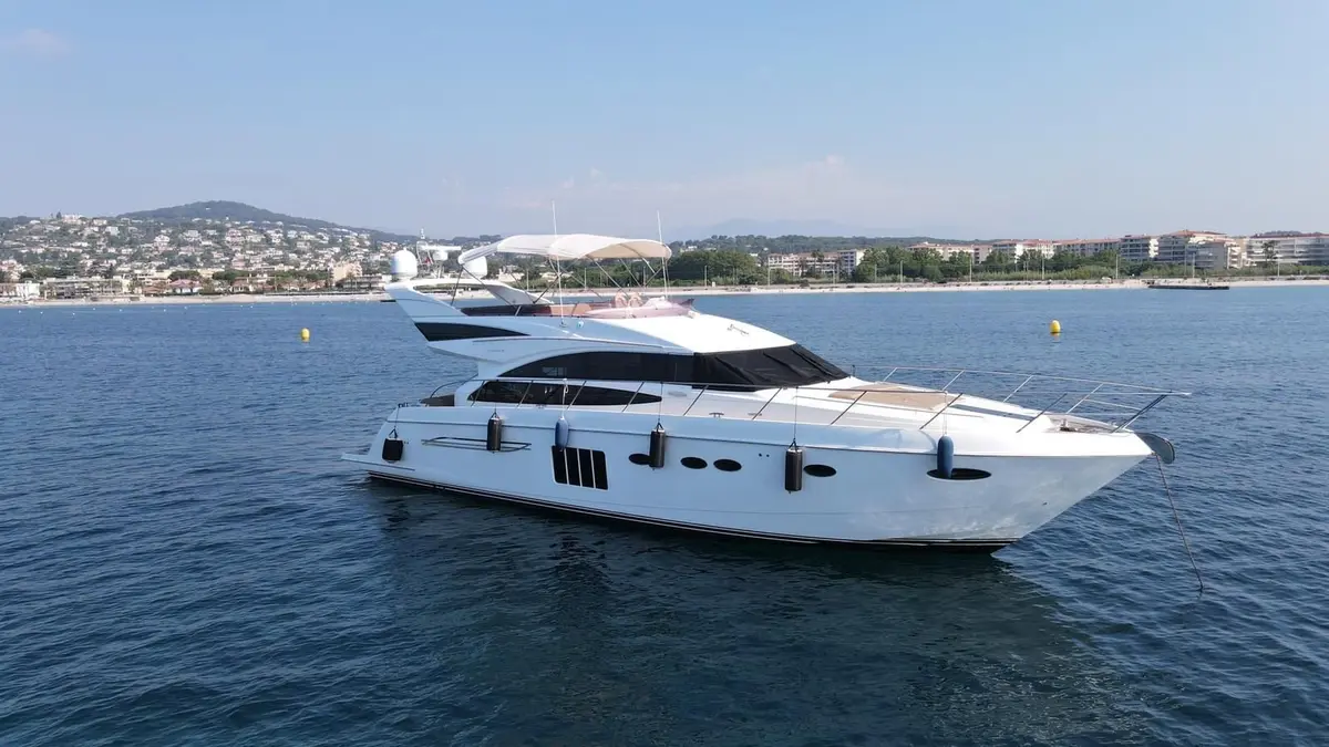 Princess 64 Fly, aft deck — Priveo Yachts, Europe. Flybridge comfort for ten across the coast