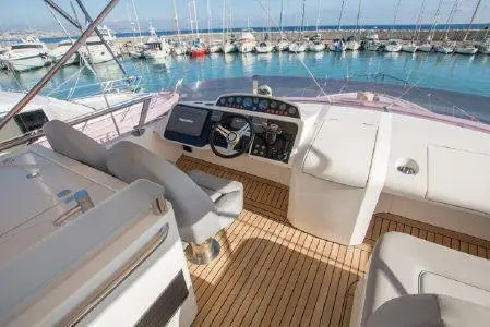Princess 64 Fly, flybridge — Priveo Yachts, Europe. Flybridge comfort for ten across the coast