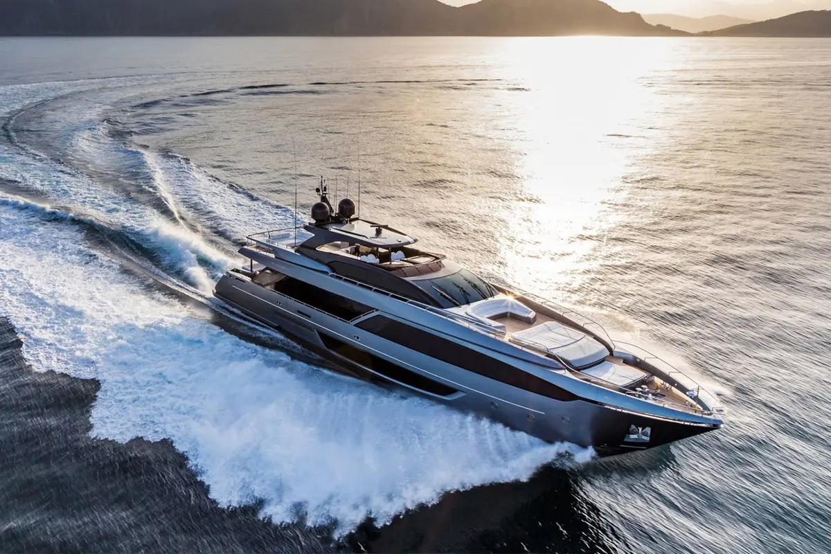 Riva 110, main deck — Priveo Yachts, Europe. A low sculpted hull built for coastal speed