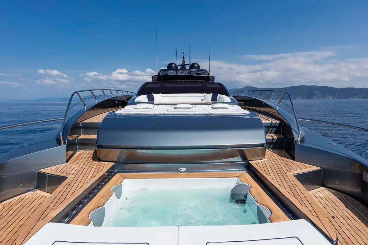 Riva 110, aft deck — Priveo Yachts, Europe. A low sculpted hull built for coastal speed