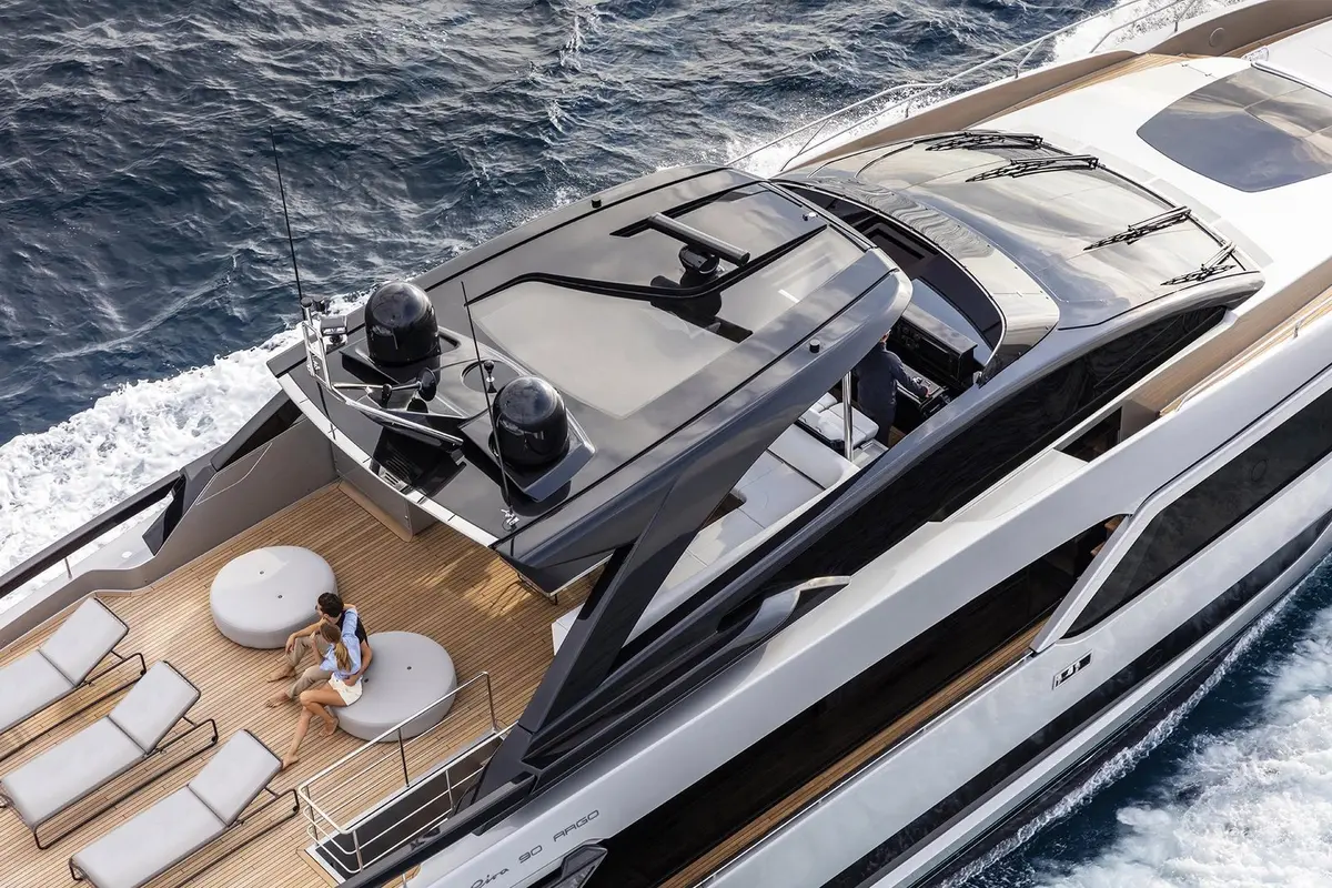 Riva 90, aft deck — Priveo Yachts, Europe. A low, sculpted hull built for fast coastal days
